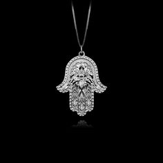 Elevate your style with our 14k Gold Hamsa Hand Pendant. This solid gold necklace showcases exquisite craftsmanship, symbolizing protection and blessings. The 14 karat gold Hamsa Hand pendant is more than just jewelry; it's a fine representation of symbolism and cultural significance, also available in 18k yellow gold. PENDANT INFORMATIONThis pendant is made of real, solid gold.• Made in USA• Material: 14k or 18k solid gold• Finish: polished• Height: 1.25" (31,5 mm) x Width: 0.95" (24 mm)• Penda Phoenix Pendant, Hand Pendant, Gold Hamsa, Hamsa Pendant, Gold Dragon, Solid Gold Necklace, Solid Gold Chains, Mini Pendants, Dragon Pendant