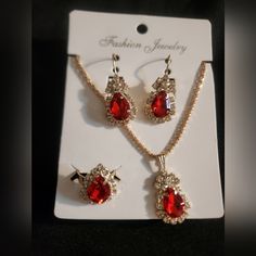 Brand New Red Fashion Jewelry Set Includes Necklace, Earrings, And Adjustable Ring Red Ruby Jewelry Sets As Gift, Red Ruby Jewelry Sets For Gifts, Ruby Jewelry Sets For Party, Red Ruby Jewelry Sets For Party, Elegant Red Jewelry Sets For Party, Red Costume Jewelry Sets For Formal Occasions, Red Costume Jewelry For Valentine's Day, Red Christmas Jewelry, Red Jewelry For Valentine's Day Party