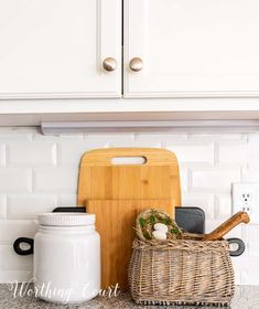 the kitchen counter is clean and ready to be used as a place for cutting vegetables