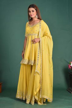 Beautiful yellow embroidered peplum sharara suit with dupatta. It is perfect for weddings and special occasions. Shop online from Pure Elegance. Peplum Sharara Suit, Peplum Sharara, Indian Designer Dresses, Suit With Dupatta, Sharara Suits, Wedding Lehengas, Designer Lehengas, Suits Wedding, Sharara Suit