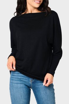 This sweater knit top is the epitome of relaxed style. With its eased fit and slouchy/off-shoulder design, it exudes effortless charm. The long sleeves feature high cuffs, adding a touch of sophistication. Made from super soft fabric, it offers both comfort and a luxurious feel. 50% Rayon | 28% Polyester | 22% Nylon Hand Wash Cold, Dry Flat Length 25 1/2" (size small) Drape Wide Neck Long Dolman Sleeve Eased Fit Easy 30-Day Returns & Exchanges Sabrina is 5'7 and wearing XS in Black & Martini Oli Versatile Funnel Neck Top With Ribbed Cuffs, Winter Long Sleeve Stretch Off-shoulder Top, Stretch Long Sleeve Off-shoulder Top For Fall, Stretch Long Sleeve Off-shoulder Top For Winter, Versatile Oversized Turtleneck Tops, Funnel Neck Top For Loungewear, Trendy Long Sleeve Off-shoulder Top For Fall, Trendy Fall Off-shoulder Long Sleeve Top, Versatile Tops With Ribbed Cuffs For Layering