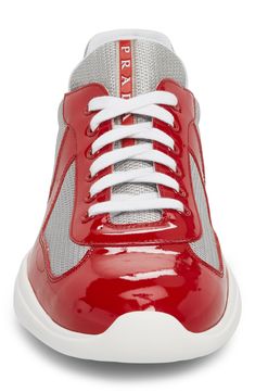 Modern mesh inlays add a touch of texture to a sporty sneaker formed from high-shine patent leather. Style Name:Prada Americas Cup Sneaker (Men). Style Number: 725998. Prada Americas Cup, Americas Cup, Sporty Sneakers, Sneaker Men, Leather Style, Patent Leather, Rubber Sole, Prada, Men's Shoes