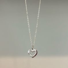 Nwot Sterling Silver Coach Necklace Approx 17” Beautiful! Classic Coach Jewelry For Gifts, Silver Dainty Heart Necklace, Everyday Silver Coach Jewelry, Classic Sterling Silver Double Heart Necklace, Classic Silver Necklace With Heart Charm, Everyday Heart-shaped Jewelry With Sterling Silver Clasp, Everyday Silver Open Heart Jewelry, Classic Heart-shaped Sterling Silver Necklace, Silver Open Heart Jewelry For Everyday