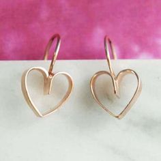 Dainty, cute and highly wearable, these Lace Heart Drop Earrings are made by our silversmith by shaping flat Sterling Silver wire carefully and creatively into a heart profile and attaching the ear wire before being plated in Rose gold in our UK workshop. Available in Silver, Gold and Rose Gold vermeil, the earrings can be paired with the matching pendant necklace creating a lovely jewellery set ideal for gifting. Also available in: 18k Yellow Gold Plated Sterling Silver Made from: Vermeil - 18kt rose gold plated sterling silver. Meaurements: Earrings dimensions: approx 1 cm width and 1 cm height. Pendant size: approx. 1.2 cm width and 1.4 cm heigt. Our standard chain length is 16'' plus 2'' extensions which makes the total length 18'' Heart Profile, Rose Gold Drop Earrings, Gold Heart Earring, Heart Rose, Lace Heart, Rose Gold Heart, Heart Drop Earrings, Jewellery Set, Lovely Jewellery