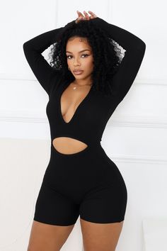 Thick ribbed sweater long sleeve romper featuring cutout detail Slip on closure Runs true to size Cutout Long Sleeve Stretch Bodysuit, Stretch Long Sleeve Cutout Bodysuit, Stretch Cutout Long Sleeve Bodysuit, Long Sleeve Cutout Bodysuit For Night Out, Black Long Sleeve Bodysuit For Loungewear, Ribbed Long Sleeve Jumpsuits And Rompers For Spring, Ribbed Long Sleeve Jumpsuits For Spring, Spring Ribbed Jumpsuits And Rompers With Long Sleeves, Black Long Sleeve Ribbed Bodysuit