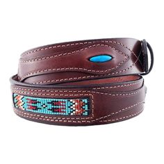 a brown leather belt with blue beads on it