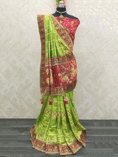 Weaving tales of the expert craftsmanship and creativity involved, this green & red color vichitra crackle & cadbury silk material saree embellished with diamond work with heavy jacquard lace border, and adding charm to it is the fancy latkan with beautiful pallu.
Coming with a contrasting red color fentam silk material blouse and embellished with floral work and embroidery border work blouse. Pair it up with some gold jewelry and be a sensation.
This saree is 5.50 meters long and comes with ful Green Art Silk Pre-draped Saree With Embroidered Border, Green Dola Silk Pre-draped Saree With Dupatta, Embroidered Green Pre-draped Saree In Dola Silk, Green Embroidered Pre-draped Saree, Green Dola Silk Pre-draped Saree For Diwali, Green Chinon Pre-draped Saree For Navratri, Festive Green Pre-draped Saree With Embroidered Border, Green Embroidered Chanderi Fabric Saree, Green Chanderi Embroidered Fabric Saree