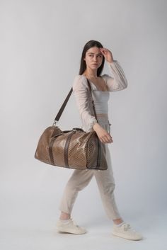 With the perfect mix of fashion and function, our travel accessories were made for you! Check out our vegan leather travel bags, backpacks, suitcases and more. You're sure to love how effortless your travels become with Packs! #travelaccessories #travel #fashion Luxury Beige Leather Travel Bag, Beige Leather Duffle Bag For Weekend Trips, Beige Leather Duffle Bag With Luggage Sleeve, Casual Leather Travel Bag With Leather Trim, Casual Leather Duffle Bag With Leather Trim, Duffle Bag Outfit, Travel Accessories For Women, Leather Travel Accessories, Best Travel Backpack