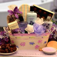 a basket filled with lots of different items next to a bowl of nuts and cookies