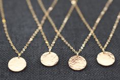 Delicate gold hammered disc necklace.  Shiny, delicate, and perfect for your bridesmaids. Disc measures 1/2 inch.  Sterling silver, 14k gold fill or rose gold filled disc on sterling silver chain is available. Make your selection at checkout.   All gold components are 14k GOLD FILL which is very durable and much heavier than gold plated, which it should not be confused with.  Gold fill will not lose its surface color as fast as plated metal.  It will remain rich in color and keep its luster.  It will act and wear as solid 14k gold at a fraction of the price.  Model is petite/small framed and is wearing 16 inches. Not sure what length to order?  Copy and paste this address in a new browser window: www.pinterest.com/pin/214695107208308498/ All bridesmaids gifts are package beautifully and re Jewelry Making Pearls, Hammered Pendant, Hammered Silver Jewelry, Gold Disc Necklace, Silver Jewelry Diy, Circle Jewelry, German Silver Jewelry, Jewelry Words, Gold Medallion