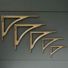 Want to add a touch of timeless elegance to your walls? Our classic ironbridge bracket is not just heavy-duty, it is stylish too. These are solid cast brushed satin brass shelf brackets which are high quality just like they were made in the good old days. Cast by hand using time-honoured techniques. The bracket is brushed by hand and finally lacquered to protect the finish.  Please note, light patination marks might show on this product due to the process used.   * A Classic Design  * High-Quali Brass Shelf Brackets, Brass Shelf, Brass Shelves, Shelving Brackets, Kitchen Wall Shelves, Brass Kitchen, Shelf Brackets, Satin Brass, The Good Old Days