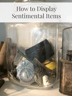 a glass jar filled with items on top of a table