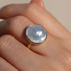 This one-of-a-kind ring is handmade from solid 14k gold and features a beautiful organically shaped white Tahitian mabe pearl that has very nice luster. Organically shaped ring shank compliments the freeform shape of the pearl. Size 7 3/4- 8ish. Can be sized up or down a bit in either direction. Mabe Pearl Rings, Pearl Rings Vintage, Gold Pearl Ring, Ring Shank, Mabe Pearl, Purple Jewelry, Girl Jewelry, The Pearl, Pearl Size