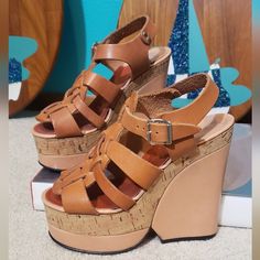 Absolutely Fantastic 1960s/70s Diorsini Leather Platform Sandals. The Base And Insole Is Made Of Peach Leather. The Base Also Has A Cork Wrapped Contrast. The Upper Is Made Of Contrasting Caramel Leather With A Simple Overlapped Design. These Babies Have A Whopping 5 1/2" Heel, The Front Platform Is 1 3/4". Wow! These Have Such A Fantastic Profile! These Are In Great Vintage Condition, The Soles Have Wear On Them. The Inside Shoe Label Is Peeling Up A Little On The Arch But Nothing Major. The Leather Is Still Soft And Supple These Are Roughly About A Size 7 1/2-8 From Heel To Toe They Measure 9" 2 3/4" Wide At The Ball Vtg 70s Brown Leather Cork Platform Wedge Heels Shoes Sand Inside Shoes, Platform Wedge Heels, Studio 54, Leather Platform Sandals, Shoes Heels Wedges, Platform Wedge, Heels Shoes, Platform Wedges, Platform Sandals