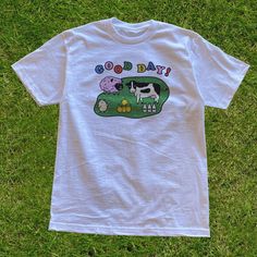 These farm shirt is perfect for those who love the colorful and wonderful kawaii clothing and kidcore clothing aesthetic. It's kawaii shirt and kidcore shirt for those who loves the farm life or those who just simply grew up playing farming simulation games. This Y2K Aesthetic T Shirt is a perfect gift for her, gift for him, gift for gamers or anyone in between as these shirts are unisex. Available in Sizes XS, S, M, L, XL, 2XL and 3XL. ✨ 100% ⭐️ PREMIUM ⭐️ Airlume combed and ringspun cotton  ✨ Cute Graphic Design T-shirt For Summer, Kawaii Cotton T-shirt For Streetwear, Kawaii Cartoon Print Relaxed Fit T-shirt, Kawaii Style Cartoon Print Relaxed Fit T-shirt, Kawaii T-shirt For Spring Streetwear, Kawaii T-shirt For Summer Streetwear, Kawaii Summer T-shirt For Streetwear, Kawaii Summer Streetwear T-shirt, Kawaii Cotton T-shirt With Letter Print