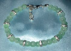 Glass Bead Bracelet With Silver Cubic Zirconia Spacers and  Stainless Steel Hypoallergenic Hardware Glass Bead Bracelet, Green Bracelet, Glass Beaded Bracelets, Jade Green, Bead Bracelet, Charm Bracelets, Glass Bead, Crystals And Gemstones, Favorite Jewelry