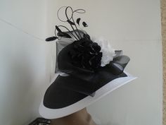 Black High Crown Top Hat For Spring, Spring Black Top Hat With High Crown, Black High Crown Top Hat, Summer Black Hats With Feather Trim, Black Summer Hats With Feather Trim, Black Summer Hat With Feather Trim, Formal Fitted Mini Hat With Feather Trim, White Fitted High Crown Hat, Spring Formal Fitted Mini Hats