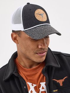 Rope ‘em up Wrangler® style with the Wrangler Collegiate Rope Trucker Cap. This snapback hat is made of a comfortable cotton blend with a mesh back to keep you cool. It comes with a rope cord detail plus a cork patch of your school’s name and logo for an authentic gameday look. Cheap Collegiate Adjustable Trucker Hat, Casual Baseball Cap With Curved Bill For Rodeo, Casual Curved Bill Hat For Rodeo, Collegiate Adjustable Trucker Hat With Curved Brim, Casual Snapback Hat For Rodeo, Casual Rodeo Hat With Curved Bill, Casual Flat Brim Baseball Cap For Rodeo, Cotton Trucker Snapback Hat, Casual Snapback Baseball Cap For Rodeo