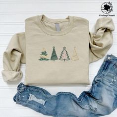 Christmas Trees Embroidered Sweatshirt, Cute Christmas Family Matching Sweater, Xmas Embroidered Tree, Tree Sweatshirt, Holiday Sweatshirt Not only do we provide create quality, we provide great customer service How to Order: * Select your sweatshirt color and size. * Choose the quantity. * Add your information to the personalization box (if requested). * Then "Add to Cart." * Select the shipping option. * Proceed to Checkout. UNISEX SWEATSHIRTS SIZING RECOMMENDATIONS 📌For a Slim Fit - Size One Embroidery Christmas Gifts, Embroidered Christmas Tree, Embroidery Winter, Embroidery Crewneck, Sweatshirt Embroidery, Tree Sweater, Xmas Tees, Womens Christmas Shirts, Embroidery Sweater