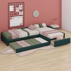 a bedroom with pink walls and green bedding