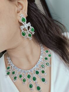 "Hey, Welcome to our shop! Royal Sabyasachi Wedding Bridal White Gold Plated Emerald Necklace set/Sabyasachi jewelry/ American Diamond wedding set/AD Bridal set/Designer Green Crystal tyaani Jewellery /Punjabi Pakistani Hollywood Bollywood Style/ CZ Unique Collection/ Statement Earrings Set/ emerald set  < 1 DAY ITEM SHIPMENT | 7-8 Days Delivery TIME> About our Jewellery - Classic, Brilliant & Elegant. We deal in all type of Premium Indian Bollywood Jewellery. * AD Jewelry set * Kundan Necklace * Polki Jewellery * Uncut Jewellery * AD Ring * AD Bangles * AD Pendant Set * Pachi Kundan & many more.. * All our products are made with high-quality stones, the intricate texture and design makes it a must-have for every modern woman. 100% Brand New & 100% High Quality All jewelry Sets & Other Pro Silver Emerald Necklace With Stone Work For Wedding, Traditional Diamond Emerald Necklace For Wedding, American Diamond Chandbali Wedding Jewelry, American Diamond Chandbali For Wedding, Wedding Jewelry With Meenakari And Diamonds, Formal Diamond Bridal Necklace With Meenakari, Cubic Zirconia Chandbali Wedding Jewelry, Formal Bridal Necklace With Tilla And Diamonds, Formal Bridal Necklace With Diamond And Tilla