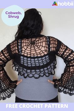 a woman with her back to the camera wearing a black crochet shrugr