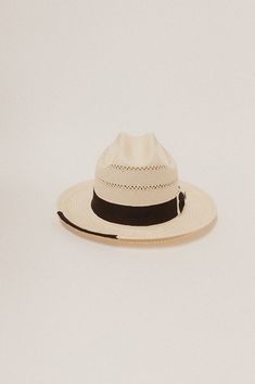 DESCRIPTION The Tremé features a mid size brim and cattleman crown. It's made of fine, handwoven paper straw. Delicate venting makes the hat a great summer option in the heat. The hat's distressed band is comprised of thick stacked, two-tone grosgrain ribbon and bow — topped off with a brass Two Roads crest pin. You'll also find a small piece of grosgrain edging on the front right corner. HAT SIZE CHART 55 57 59 61 63 Size S M L XL 2XL Inches 21 1/2" 22 1/4" 23 23 7/8" 24 5/8" Fitted Size 6 7/8 White Toquilla Straw Country Fedora, Handwoven Curved Brim Straw Hat For Kentucky Derby, Rodeo Woven Fedora With Curved Brim, Woven Fedora With Curved Brim For Rodeo, Rodeo Fedora With Woven Detail And Curved Brim, White Straw Fedora For Rodeo, Handwoven Flat Brim Panama Hat For Rodeo, Handwoven Western Panama Hat For Spring, Handwoven Straw Panama Hat With Curved Brim