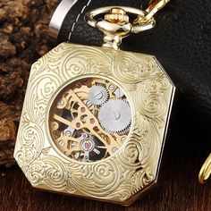 If you're on a budget and need a stylish pocket watch, this is the excellent choice! The creditable skeleton design and astonishing analog display of this watch will polish your look. Notable features are the square case, versatility for both genders, and a gorgeous gold finishing for an elegant classic touch. 

Specifications
Item Type: Pocket & Fob Watches
Case Material: Stainless Steel
Style: Antique
Gender: Unisex
Feature: mechanical pocket watch
Dial Diameter: 0.048m
Bezel Function: Station Stainless Steel Pocket Watch With Skeleton Dial For Gift, Gold Pocket Watch With Metal Dial, Metal Skeleton Dial Watch As Gift, Metal Skeleton Dial Watch For Gift, Metal Skeleton Dial Watch, Formal Metal Pocket Watch With Skeleton Dial, Gold Steampunk Watch With Skeleton Dial, Vintage Gold Pocket Watch In Stainless Steel, Gold Stainless Steel Formal Pocket Watch