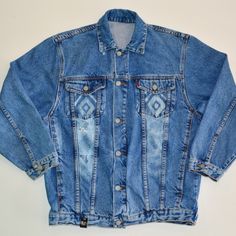 Beautiful blue 100% cotton denim jacketSustainably sourced second handbleach art pattern on front panelsBleach art cosmic cowboy across the backVegan leather Visos tag6' 2" and 170 lb. model Retro Blue Distressed Outerwear, Blue Retro Distressed Outerwear, Medium Wash Denim Outerwear For Rodeo, Western Style Medium Wash Denim Jacket With Pockets, Western Denim Jacket With Pockets In Medium Wash, Festival Medium Wash Denim Outerwear, Vintage Blue Denim Jacket For Festival, Winter Festival Medium Wash Denim Jacket, Western Blue Denim Jacket