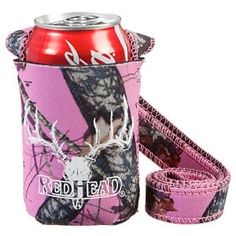 a can cooler with pink camo straps and a red head logo on the side