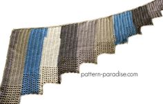 a crocheted afghan is shown with blue and gray stripes on it's edges