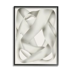 an abstract art piece in black frame with white paper on the bottom and light grey background