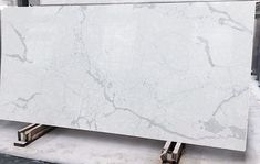 a large white marble slab sitting on top of a pallet