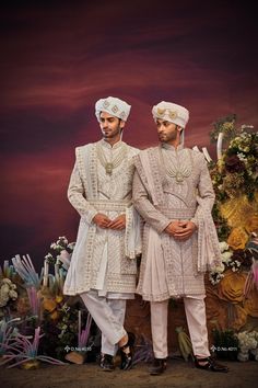 Make a grand statement on your special day with a luxurious Sherwani crafted from premium fabrics (like silk, brocade, or georgette) for ultimate comfort and sophistication. Our collection boasts a variety of designs to suit every taste: Classic elegance: Opt for a timeless Sherwani with intricate embroidery on the collar or cuffs. Modern flair: Go for a Sherwani with a unique neckline or a trendy color palette. Regal opulence: Choose a Sherwani with rich embellishments like zardozi work for a t Brocade Sherwani With Traditional Drape For Weddings, Wedding Sherwani In Brocade With Traditional Drape, Traditional Brocade Sherwani For Reception, Brocade Bandhgala With Traditional Drape For Wedding, Festive Brocade Sherwani For Traditional Ceremonies, Wedding Sherwani In Brocade With Cutdana, Wedding Sherwani With Cutdana On Brocade, Brocade Sherwani For Traditional Ceremonies And Eid, Fitted Brocade Sherwani For Traditional Ceremonies