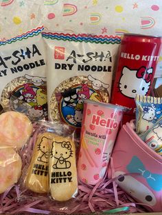 the hello kitty hamper is packed with cookies, candy and other treats for kids