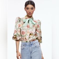 New With Tags. Alice + Olivia's Brentley Tieneck Blouse Is Crafted Of Floral Satin. Long Blouson Sleeves With Smocked Cuffs Complete The Look.Tieneck Long Sleeves, Smocked Cuffs Concealed Button-Front Closure 69% Viscose/31% Silk Combo: 100% Polyester Designer Spring Blouse With Floral Print, Spring Designer Office Tops, Designer Spring Party Blouse, Designer Spring Blouse For Office, Elegant Green Floral Print Blouse, Green Silk Blouse With Floral Print, Green Floral Silk Blouse, Designer Floral Print Blouse For Work, Designer Floral Print Workwear Blouse