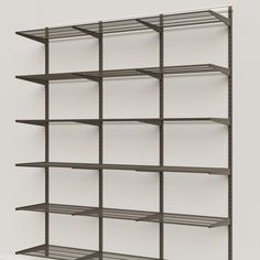 an empty metal shelving unit with six shelves on one side and four rows on the other