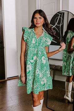 Patterned V-neck Summer Mini Dress, Patterned V-neck Mini Dress For Summer, Spring V-neck Mini Dress With Abstract Print, Summer V-neck Patterned Mini Dress, Chic Green Mini Dress With Ruffle Sleeves, Floral Print Split Neck Mini Dress For Vacation, Short Sleeve Dress With Abstract Print For Day Out, Chic Green Mini Dress With Flutter Sleeves, Summer Mini Dress With Split Neck For Day Out