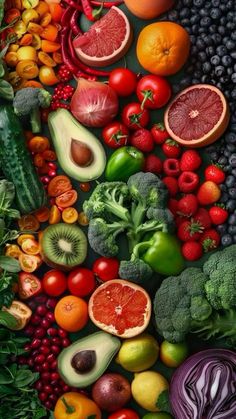 many different fruits and vegetables are arranged together