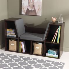 a book shelf with books and magazines on it