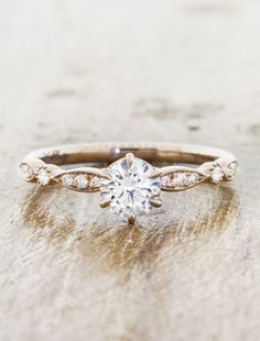 round diamond in a vintage-inspired, encrusted diamond band. caption:Shown in 14k rose gold with 0.50ct option Classic Diamond Engagement Ring, Wedding Ring Bands Set, Gorgeous Engagement Ring, Simple Engagement Rings, Classic Engagement Rings, Wedding Rings Unique, Wedding Rings Vintage, Kate Winslet, Halo Engagement Rings