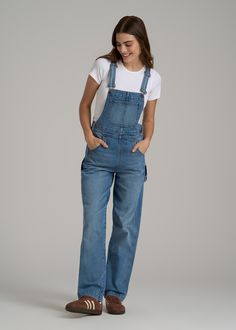 Finally! Overalls Designed for Tall Women A Casual Classic Rediscover a classic with our tall women's Denim Overalls, tailored specifically for ladies 5'9"+. These overalls blend timeless style with modern fit, ensuring you look fabulous and feel comfortable all day long. With adjustable straps and a relaxed fit, they’re easy to wear and easier to love. The double back patch pockets and side seam pockets add functionality to the chic, laid-back vibe, making these tall ladies' denim overalls perf Affordable Light Wash Overalls With Pockets, Cheap High Rise Medium Wash Overalls, Cheap Fitted Light Wash Overalls, Maurices Overalls, Womens Denim Overalls, Scrubs Dress, Athleisure Summer, Cozy Sleepwear, Malibu Blue