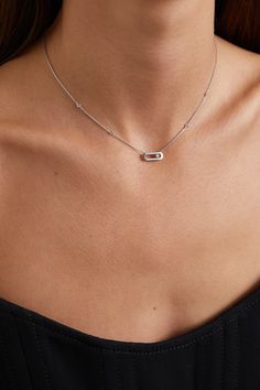 Messika's iconic 'Move Uno' necklace is centered with a diamond that glides beautifully within its 18-karat white gold case to match your movement. Simple enough to wear every day, the dainty chain is strung with twinkling stones, including a tiny one at the fastening. Display it between an open shirt or blazer.  Each Messika piece comes with a two-year warranty, which is activated 28 days after purchase. To receive an additional year's warranty, register your piece on Messika's website. White Gold Jewelry Aesthetic, Moving Necklaces, Messika Necklace, Messika Move Uno, Van Cleef Necklace, White Gold Diamond Necklace, Open Shirt, White Gold Necklace, Luxe Jewelry