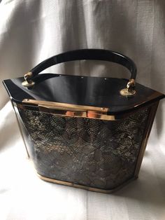 Wonderful little handbag that was purchased in Italy by a great aunt while on vacation there. In very good vintage condition.Measurements are;6 1/2” x 7 1/2” x  3 1/2”Feel free to convo me with any further questions. Thank you for your interest. Great Aunt, Glitter Top, Pearl Bag, Top Handle Bags, Handbag Heaven, Evening Purse, Vintage Purses, Vintage Lucite, Vintage Box