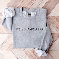 **Celebrate the Matriarch with Comfort and Style: The "In My Grandma Era" Sweatshirt** Welcome to the cozy corner of Etsy where love for grandmas is woven into every thread! Our "In My Grandma Era" Sweatshirt is the perfect way to honor the special bond between grandmothers and their loved ones. Whether she's been promoted to grandma or she's been rocking the title for years, this sweatshirt is a gift that wraps her in the warmth of your appreciation. Crafted with the softest blend of cotton and Uncle Birthday Gifts, Uncle Birthday, Grandpa Style, Cool Uncle, Comfort Gifts, Grandpa Shirt, Uncle Gifts, Gifts For Grandparents, Grandpa Gifts