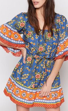 Bright Floral Print Dress Can Be Worn On Or Off Shoulder. Bell Sleeves. Tie Belt At Waist. Has Pockets!! So Cute And Perfect For Summer Or Spring Break! 100% Cotton. Spring Blue Dress With Vibrant Print, Blue Bohemian Dress With Colorful Pattern, Bohemian Blue Dress With Colorful Pattern, Vibrant Orange Printed Dress, Orange Boho Print Short Sleeve Dress, Orange Bohemian Mini Dress For Spring, Bohemian Orange Mini Dress For Spring, Orange Spring Dress With Colorful Pattern, Blue Bohemian Dress With Vibrant Print