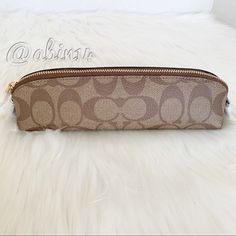 Brand New Coach Signature Pencil Case. This Little Versatile Piece Can Also Be Used As A Cosmetic Pouch Or As A Multipurpose Pouch/ Catchall. Approximate Dimensions - 8”L X 2”H X 2”W Material - Signature Coated Canvas And Leather Color - Khaki Zip Closure Smoke Free And Pet Free Home. Any Questions, Please Ask. Brown Travel Pouch Pencil Case, Brown Pouch Pencil Case For Travel, Travel Brown Pouch Pencil Case, Brown Pouch Pencil Case For Daily Use, Brown Pouch Pencil Case For Personal Use, Brown Pencil Case With Zipper For Daily Use, Travel Pencil Case With Pen Holders In Beige, Brown Portable Pencil Case For Travel, Brown Rectangular Pencil Case With Zipper