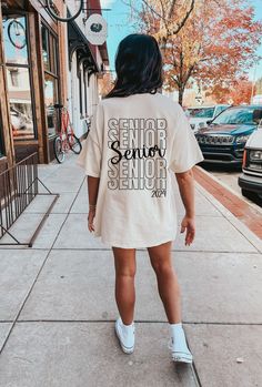 Senior 2024 Shirt, College Graduation 2024 Shirt, Class Of 2024 Hoodie, High School Grad Gift, Senior Class Tshirt, Last Day Of School Shirt WELCOME TO THE COSY STREET FASHION 🚩If you're in search of soft, comfortable, high-quality clothes, you've come to the right place!  We sell trendy and customized sweatshirts, shirts and hoodies also cool gifts for your loved ones. If you have any questions, concerns, or comments about our products, feel free to send us a message anytime 🚩If you want to c College Tshirts Design, Trending Tshirt Design Ideas 2024, Seniors T Shirts Design, High School Tshirt Design, White Crew Neck T-shirt For College Events, White Short Sleeve Hoodie For Streetwear, White Sports Slogan Top, White Short Sleeve Hoodie With Letter Print, White Collegiate T-shirt For College Events