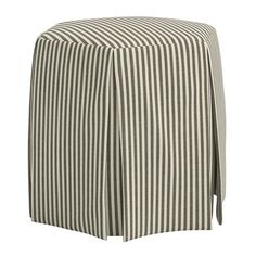 a black and white striped table cloth on top of a wooden chair with an attached seat cover