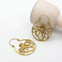 Dive into a world of oceanic charm with our brass octopus earring, featuring a stunning gold Kraken detail that brings a playful yet elegant touch to any outfit. 🎉 Hurry! Purchase within the next 24 hours to get your exclusive offer! Apply this promo code[TRIS1234] and get 38% off. IMPORTANT NOTE....👇 you will also get a surprise gift🎁on every purchase. 💥Explore more unique designs in my shop here:  https://www.etsy.com/shop/bohojwellerybazar Nickel Free Gold Ocean-inspired Earrings, Nickel Free Ocean-inspired Gold Earrings, Handmade Ocean-inspired Gold Earrings, Gold Ocean-inspired Earrings, Ocean-inspired Gold Jewelry With Ear Wire, Octopus Earrings, Brass Hoop Earrings, Brass Hoops, Animal Earrings